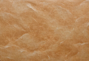 Fototapeta premium A textured background featuring crumpled, wrinkled paper in warm beige tones. The surface has a natural, organic feel, ideal for artistic or design purposes.
