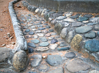 A cobblestone-lined drainage ditch in the central park of Kislovodsk