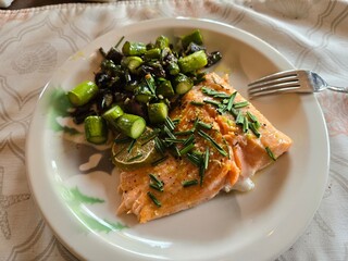 Homemade salmon steak with fresh veggies