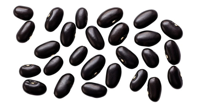 Close-up of black beans scattered on a white background. Healthy legume offering high nutritional value. Ideal for culinary and food-related themes.