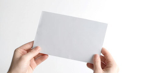 Fototapeta premium envelope in hand on a white background