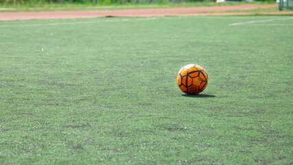 Football ball in the field. Horizontal sport theme.