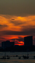 Fototapeta premium Sunset over the River with City Skyline. High quality photo