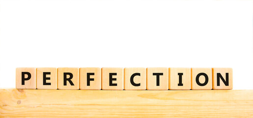 Perfection symbol. Concept word Perfection on beautiful wooden blocks. Beautiful white background. Business perfection concept. Copy space.