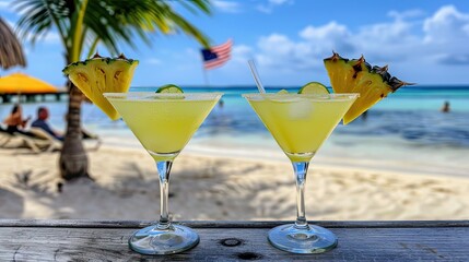 Two tropical martinis garnished with pineapple slices and lime sit on a beachside table with a vibrant ocean and palm trees in the background - AI Generated Digital Art.