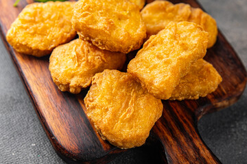 nuggets chicken meat deep fried fresh meal food snack on the table copy space food background rustic top view
