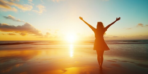 Silhouette of Freedom: A woman stands with arms outstretched against a breathtaking sunset on the beach, embodying liberation, hope, and the beauty of a new beginning.  