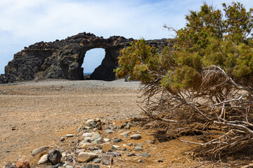 Rock with the hole at the seaside