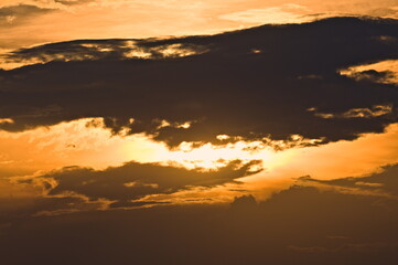 Obraz premium Very dramatic sunset clouds on the sky. Copy space for placement of text. Empty background teplate for designers.