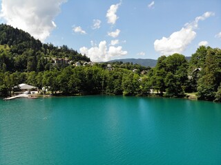 Fototapeta premium Arial footage over blue waters of Lake Bled
