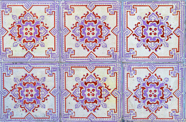 Detail of the traditional tiles from facade of old house. Decorative tiles.Portuguese traditional tiles.
