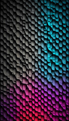 Fototapeta premium A vibrant abstract pattern featuring a textured surface with a gradient of colors transitioning from black to blue, and then to purple and pink.