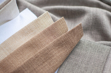 Fabric in milk, beige and gray colors for home textiles and curtains.
