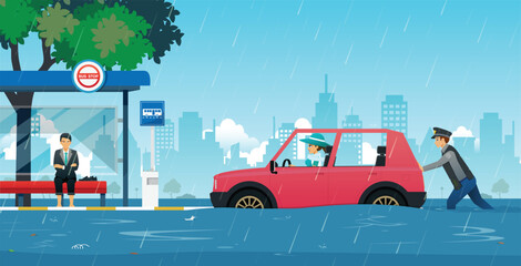 Police help push out cars damaged by floodwaters.