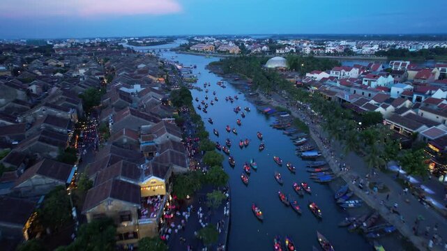 the lantern boats on the canal in hoi a night market in vietnam.the old town was a Southeast Asian trading port from the 15 to 19th century, now it become the resort city