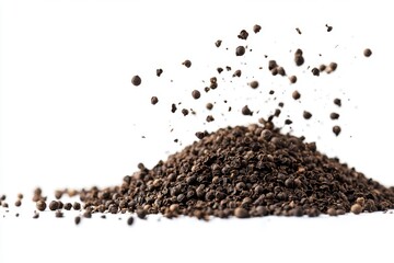 Naklejka premium Black peppercorns and ground pepper are scattered on a white background.