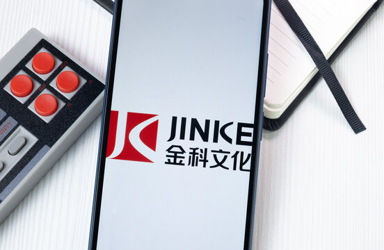 New York, USA - 1 August 2024: Zhejiang Jinke Tom Culture Industry Logo on Phone Screen, Company Icon on Display