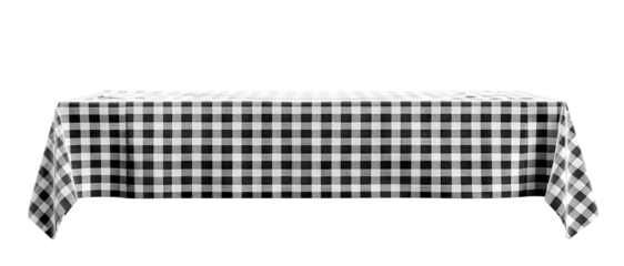 Elegant black and white checkered tablecloth draped over a long dining table, cut out