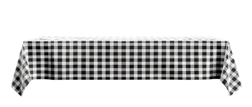 Elegant black and white checkered tablecloth draped over a long dining table, cut out