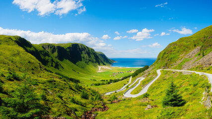 Panoramic view of the road and sea coast in Norway. Scandinavia. Nature. View of a mountain valley...