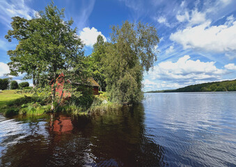 schwedischer See Fegen mit Bootshaus 