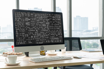 Mathematic equations and modish formula on computer screen showing concept of science and education