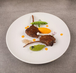 Plate Presentations , lamb chops With caviar, peas, sauce and mushrooms, fine dining concept.