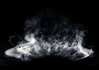 Real smoke exploding outwards. Dramatic smoke or fog effect for spooky Halloween magic.