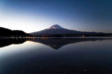 The peaceful sunrise over Mount Fuji at Lake Kawaguchi in Tokyo, Japan