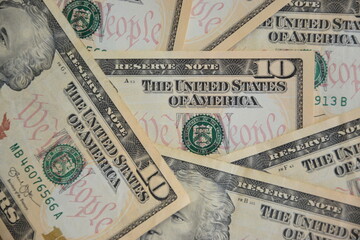 A Pile of Ten Dollar Bills as a Money Background