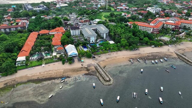beautiful view of the sea, Aerial 4K Drone Footage: Tranquil Beauty of Tanjung Benoa Beach, Bali; Luxury Resorts, Turquoise Waters, and Golden Sands; Perfect for Travel Agencies, Resorts Promo