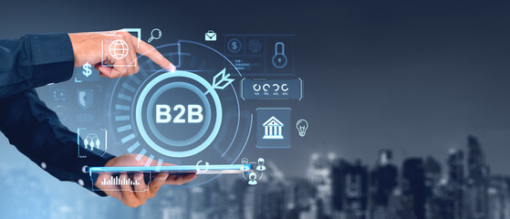 Businessman interacting with B2B interface on digital tablet in cityscape background.