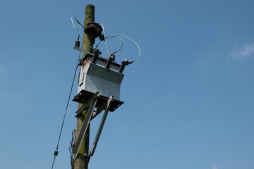 Obraz premium Electricity transformer box on a post