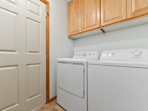 Modern residential laundry room interior
