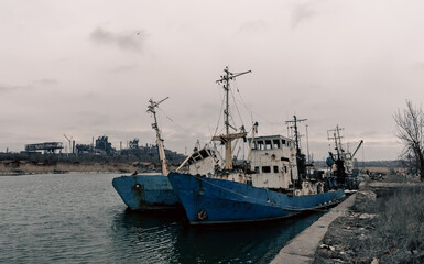 destroyed ships in the port during the war in Ukraine