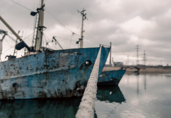 destroyed ships in the port during the war in Ukraine