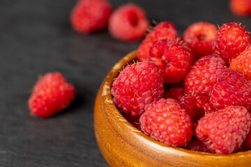 homemade harvest of ripe and healthy raspberries for food