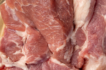 a sliced piece of pork meat from the neck