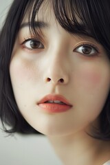 Close up Portrait of a Young Woman with Short Black Hair