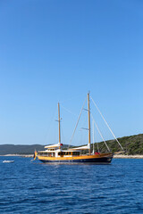 Sailing ship mooring close Croatian island