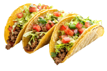Three tacos with meat and lettuce on top
