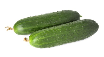 Two fresh green cucumbers isolated on white, above view