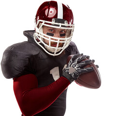 Portrait of man, American football player in helmet and uniform, standing with ball isolated on transparent background. Concept of sport event, championship, tournament, game.