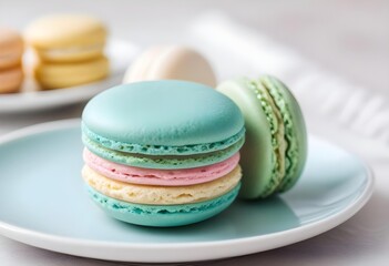 Fototapeta premium Colorful pastel macarons, captured up close, arranged on a light blue plate, ready to eat.