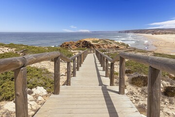 Scenic view of a pier on the Bordeiras beach in Portugal