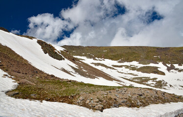 melting snow and rocks on the top of Mount Aragats (Aragatsotn province, Armenia)