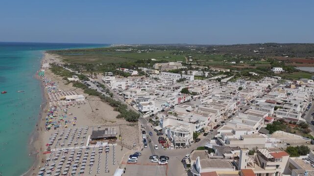 Torre Mozza is a coastal town in Salento, Puglia, known for its white sandy beaches and crystal-clear waters. The 17th-century tower, from which it takes its name, overlooks the scenic coastline