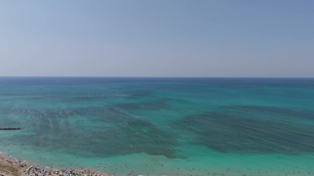 Torre Mozza is a coastal town in Salento, Puglia, known for its white sandy beaches and crystal-clear waters. The 17th-century tower, from which it takes its name, overlooks the scenic coastline