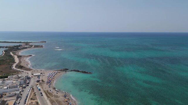Torre Mozza is a coastal town in Salento, Puglia, known for its white sandy beaches and crystal-clear waters. The 17th-century tower, from which it takes its name, overlooks the scenic coastline