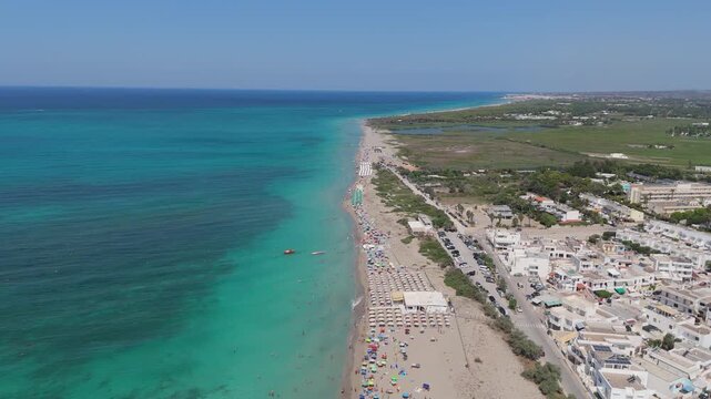 Torre Mozza is a coastal town in Salento, Puglia, known for its white sandy beaches and crystal-clear waters. The 17th-century tower, from which it takes its name, overlooks the scenic coastline